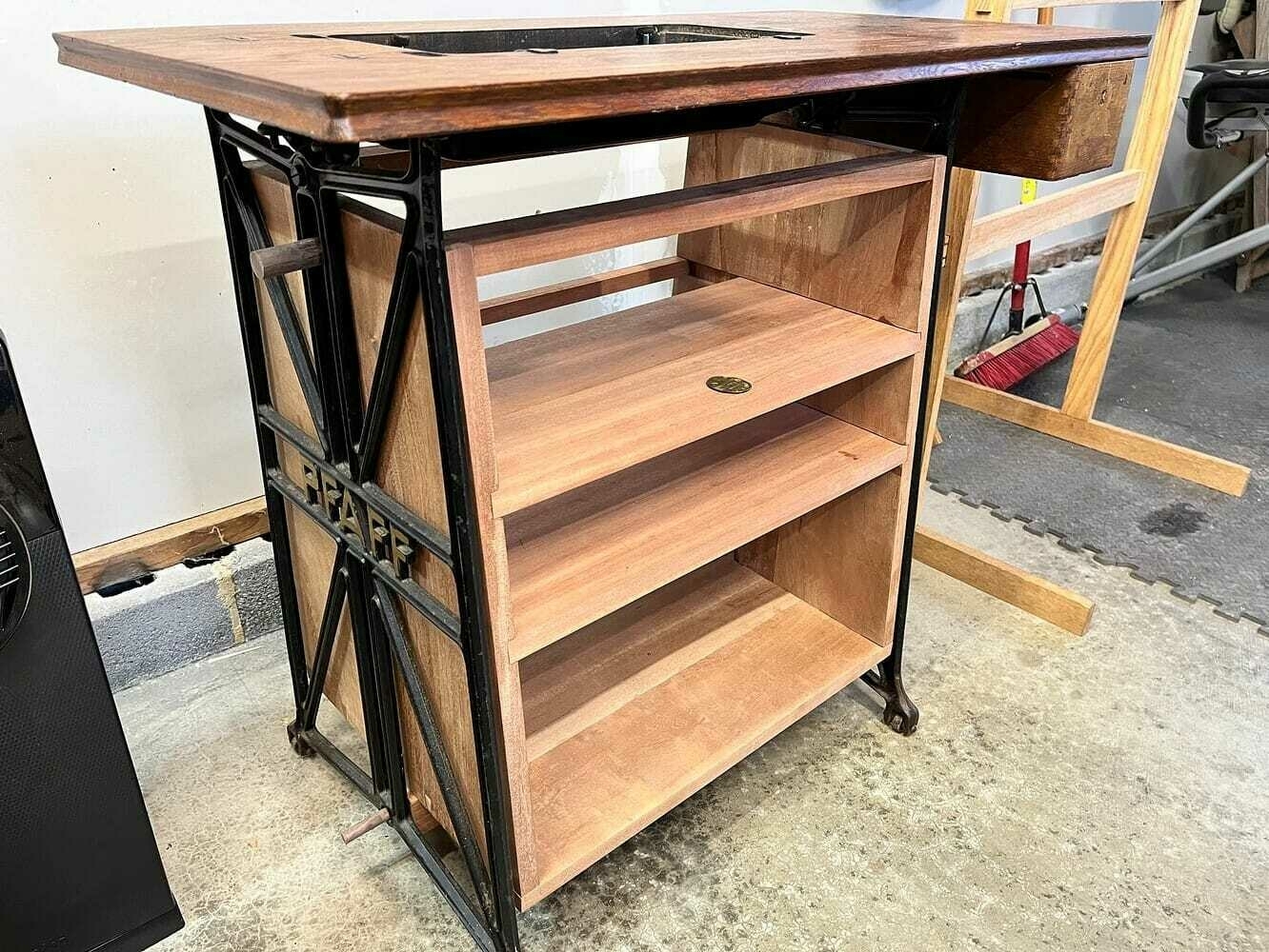 The full dry fit cabinet, showing medallion from sewing machine placed on top shelf.